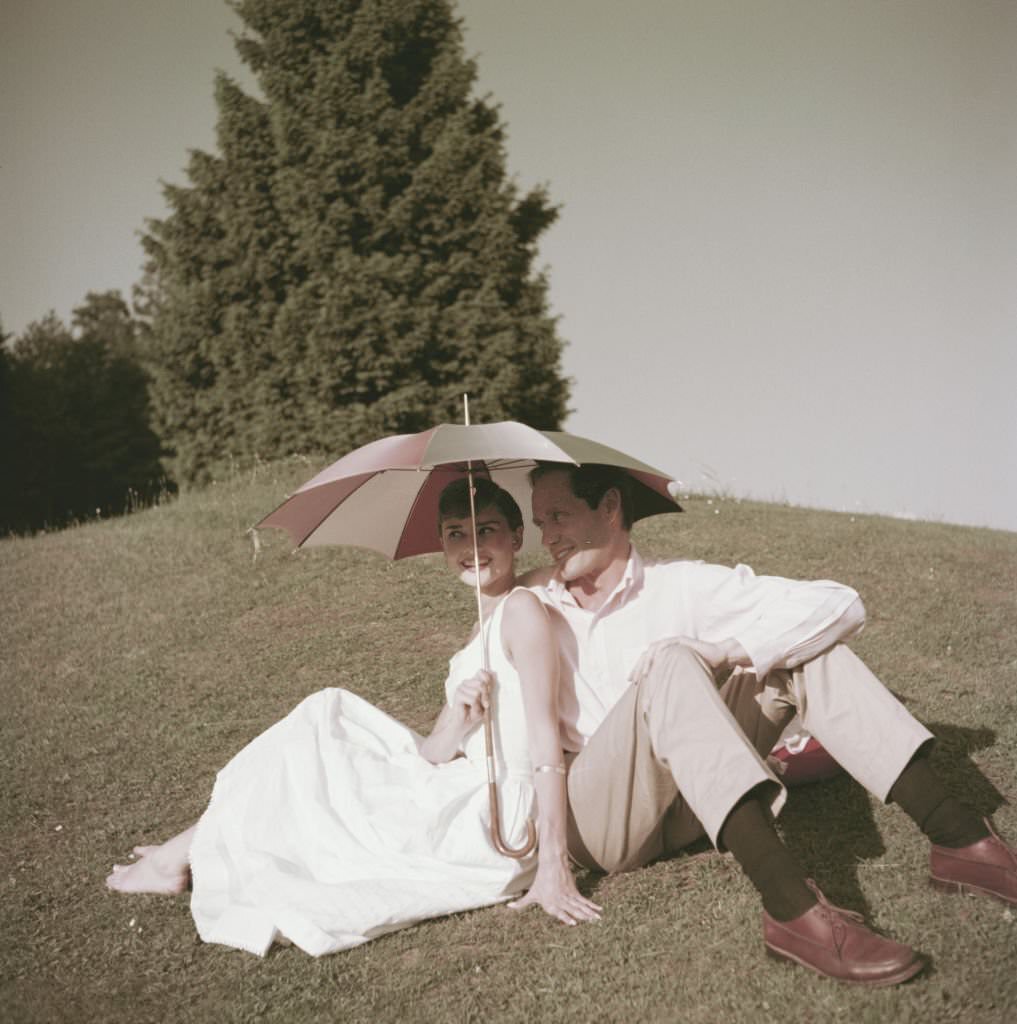 Audrey Hepburn and Mel Ferrer on a golf course at the Bürgenstock resort, Switzerland, 1954.