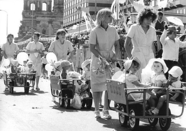 Berlin's 750th Birthday Celebration with a Parade of Portable Computers, Perms and Bikinis in East Germany