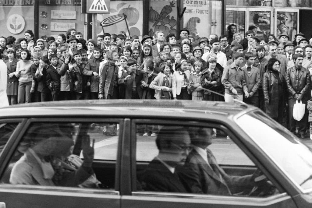 Well-wishers stand outside the National Museum of Romanian History where Crown Prince Akihito and Crown Princess Michiko.