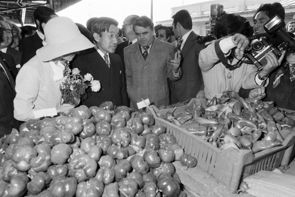 Crown Prince Akihito and Crown Princess Michiko visit a market, 1979 in Bucharest.