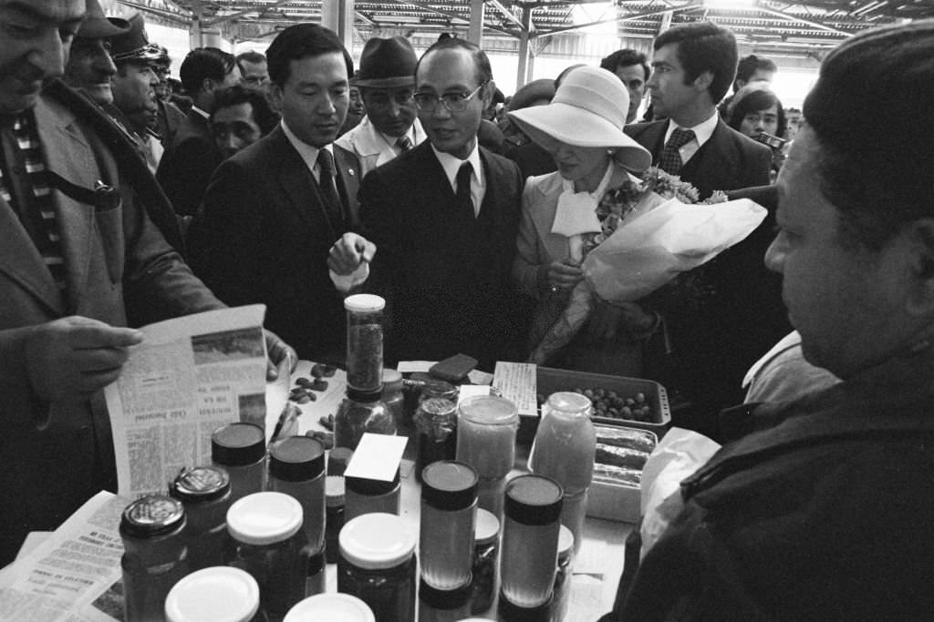 Crown Prince Akihito and Crown Princess Michiko visit a market in Bucharest, 1979
