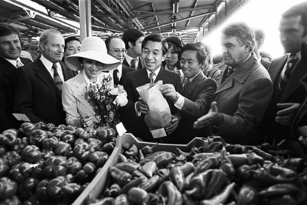 Prince Akihito and Crown Princess Michiko visit a market on October 10, 1979 in Bucharest.