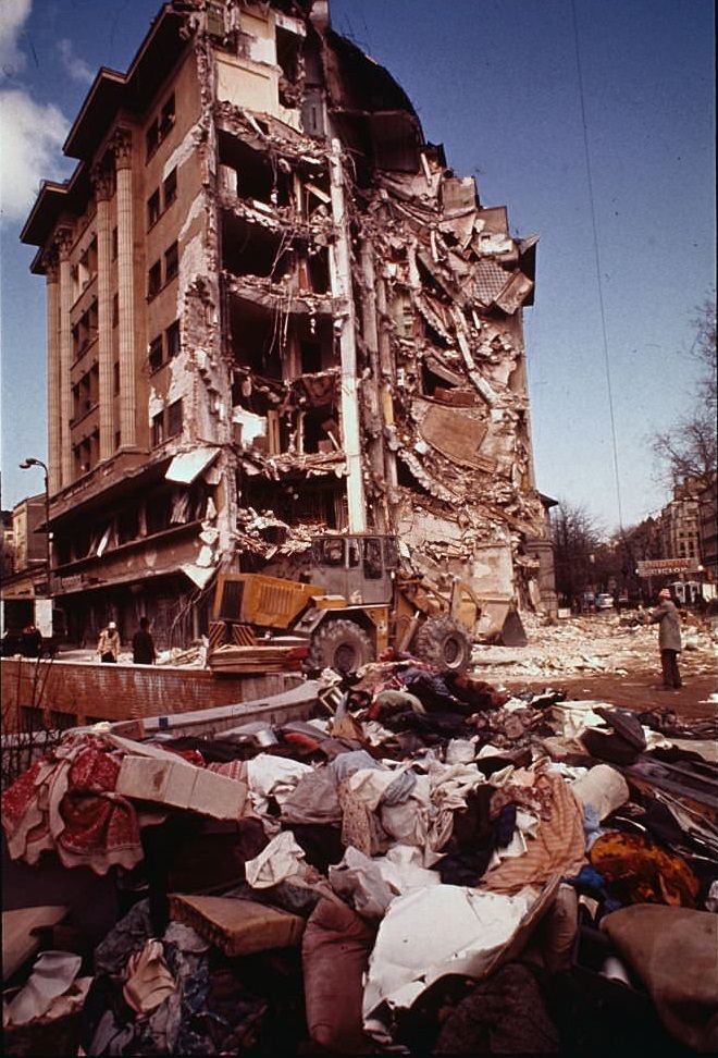 Rescue workers are shown here in Bucharest, Romania trying to clean up after the destructive earthquake.