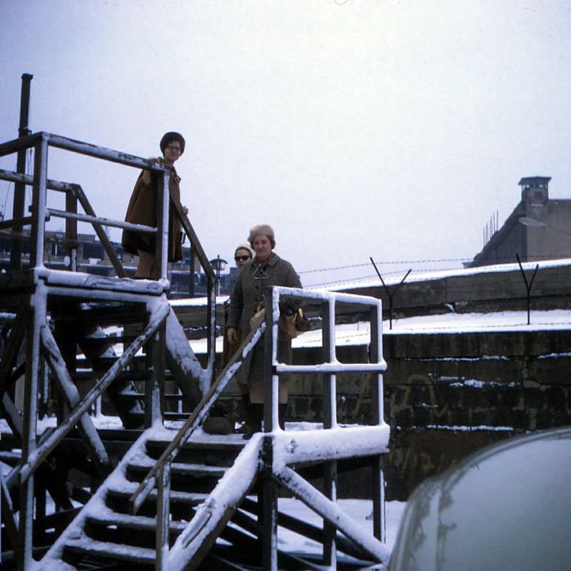 At the observation platform next to the Berlin Wall, West Berlin, February 1970