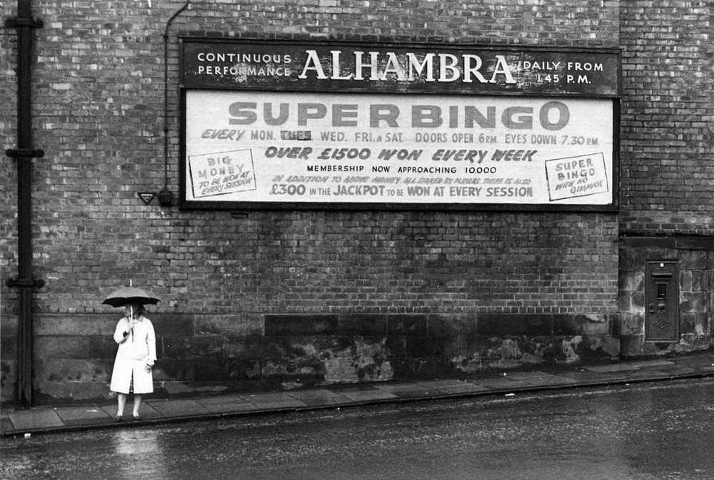 A lady with umbrella at Dunferm line, Edinburgh, 1965