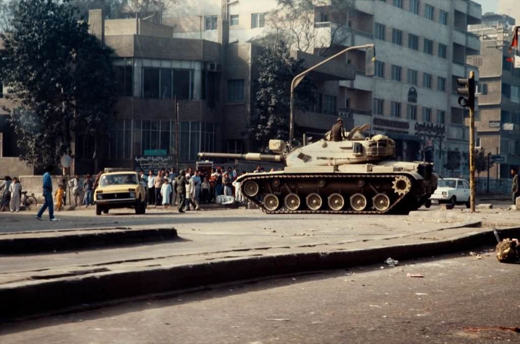 A tank from the Egyptian army is deployed in the middle of the street after the protest and police riot in Cairo, 1986.
