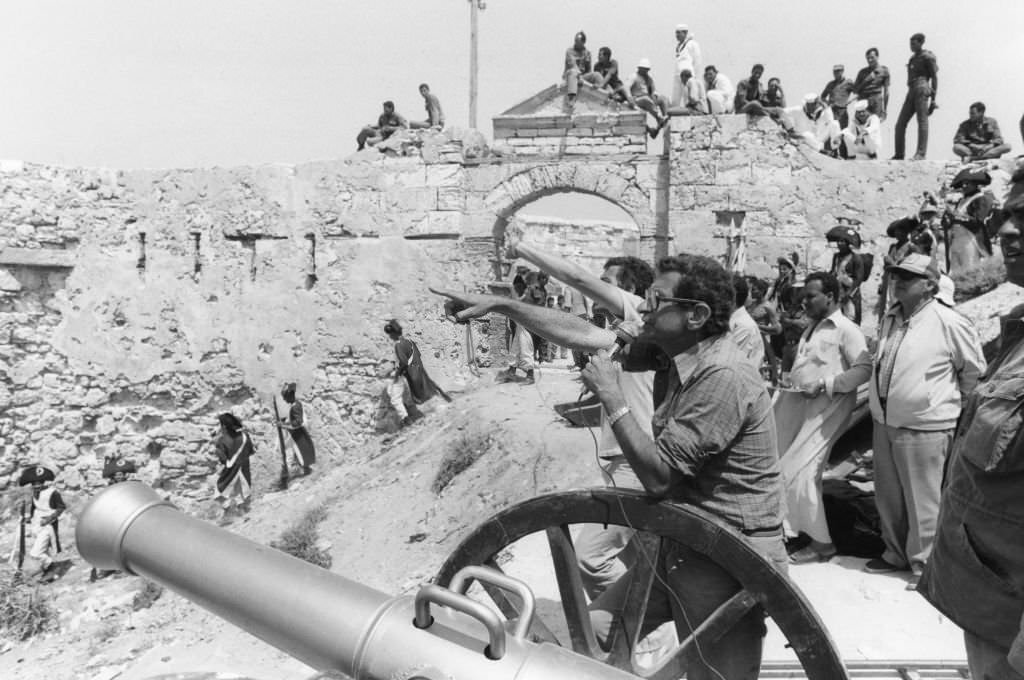 Director Youssef Chahine on the set of his film 'Adieu Bonaparte' at the foot of the pyramids in June 1984, Egypt.