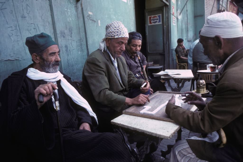 Men playing dominoes in Cairo, Egypt, 1980