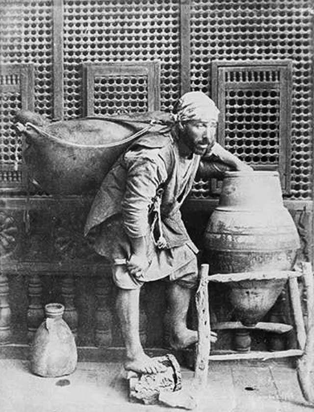 Water carrier in Cairo, 1880