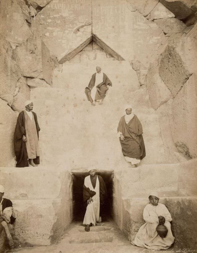 Men at the entrance to the Great Pyramid of Giza
