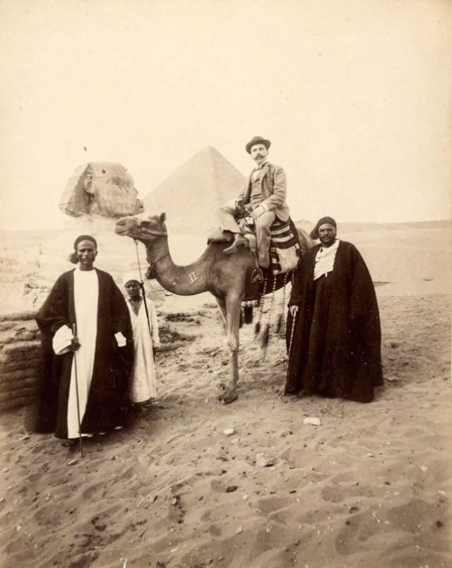 Tourist and guides with camel