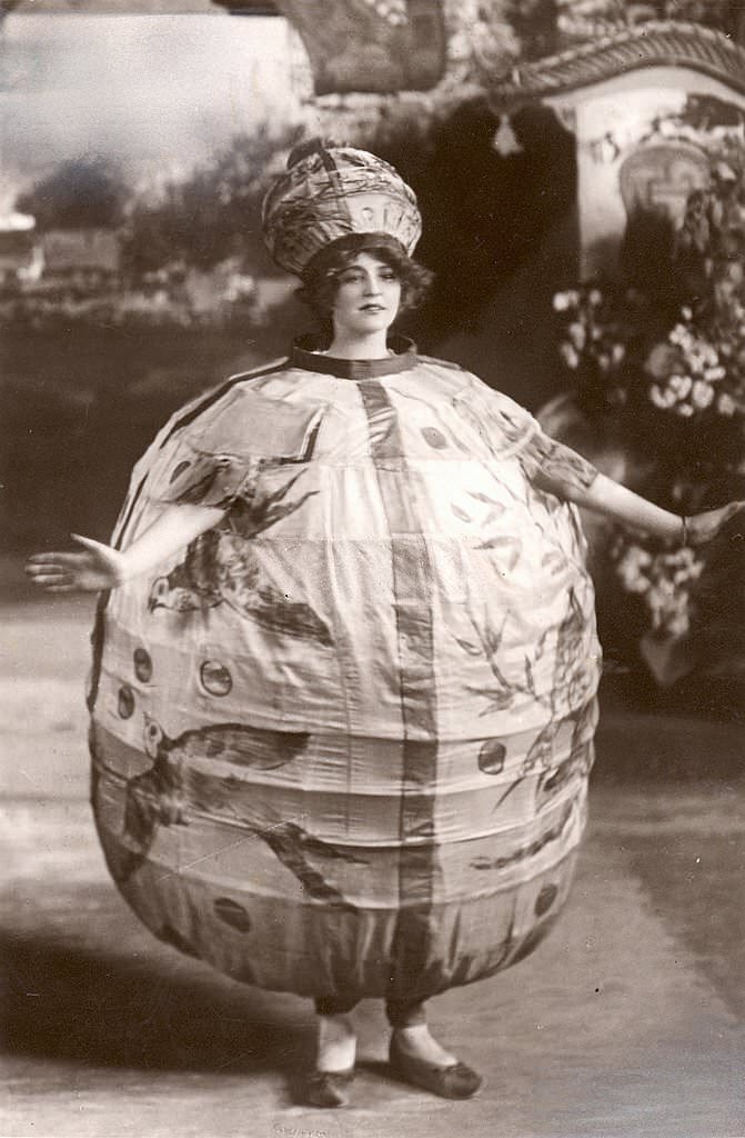 Gabrielle Ray wearing a winged costume in a publicity photo for a production of 'Little Cherub'.