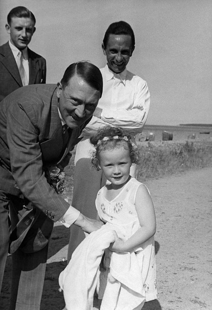 Adolf Hitler with Joseph Goebbels and his daughter Hildegard in Heiligendamm, 1939