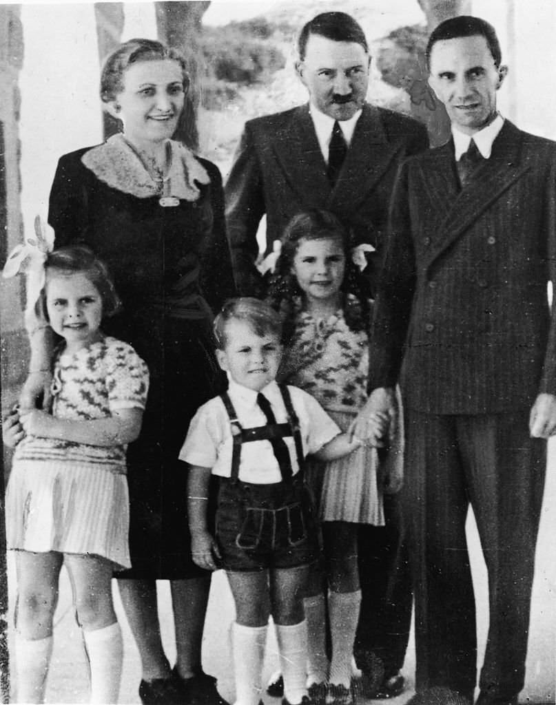 Adolf Hitler with Joseph Goebbels and his wife Magda and their three oldest children, left to right, Hilda, Helmut, and Helga, 1930s