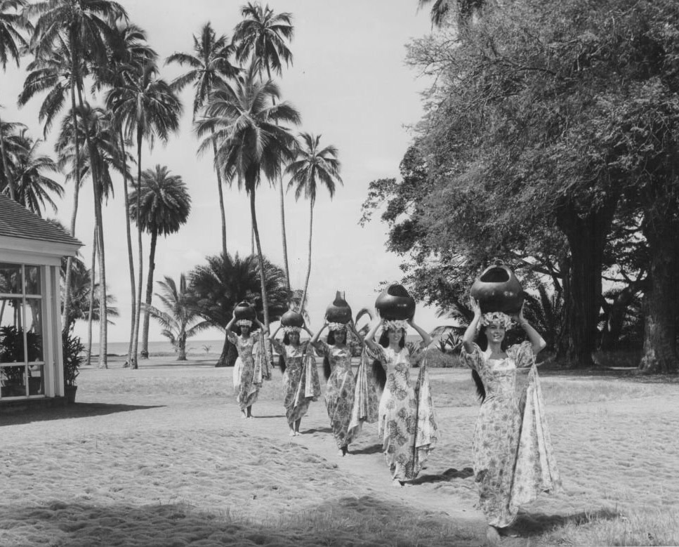 Women in traditional native Hawaiian clothing, Kauai, Hawaii, 1950s