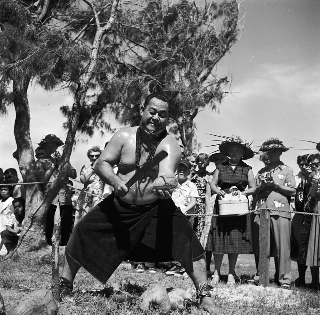 The Samoan sword is a formidable weapon of war, but it can also be useful in peacetime, 1955
