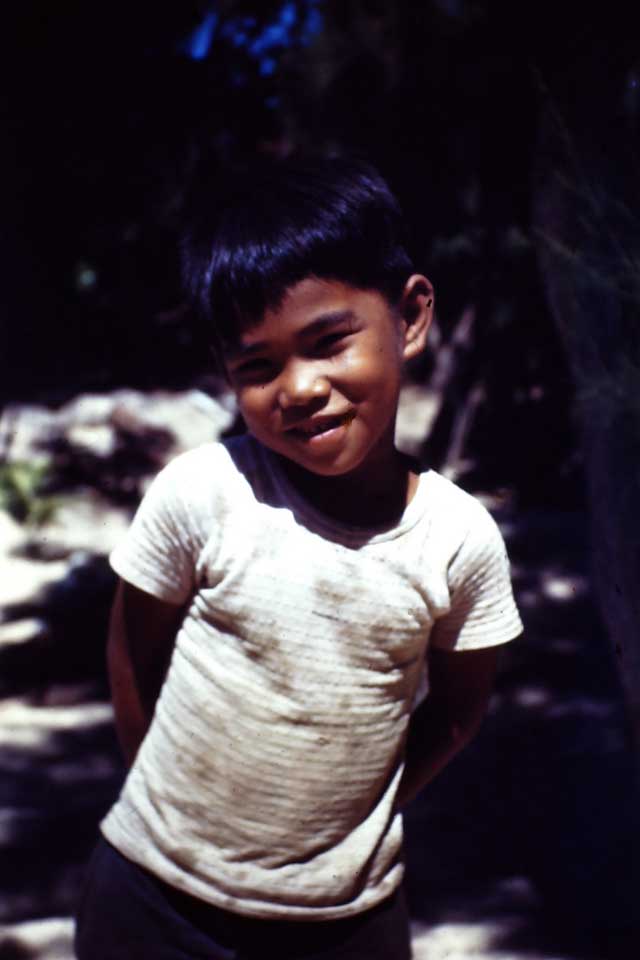 Local boy on Waikiki Beach in Hawaii, 1945