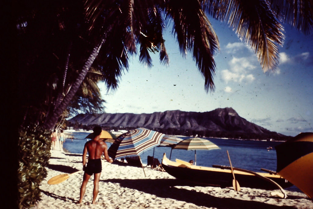Beach umbrellas with Diamond Head, Hawaii, 1945
