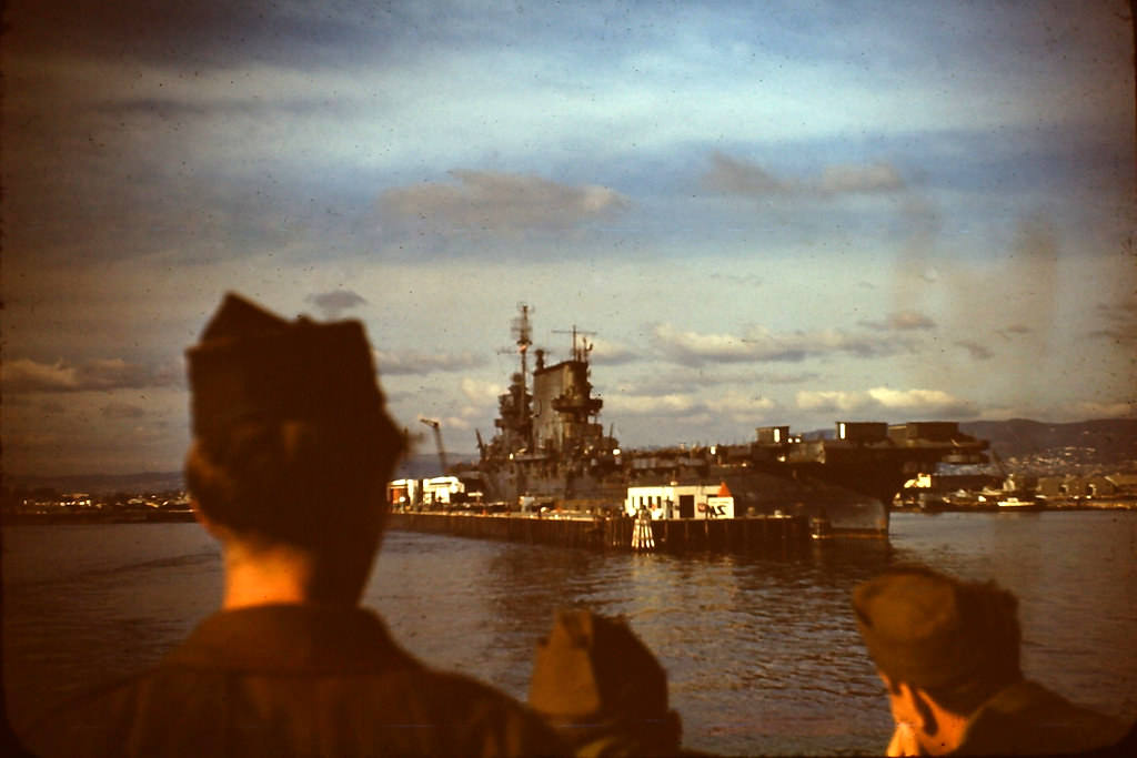 Aircraft carrier from troop transport departing for Hawaii, 1945