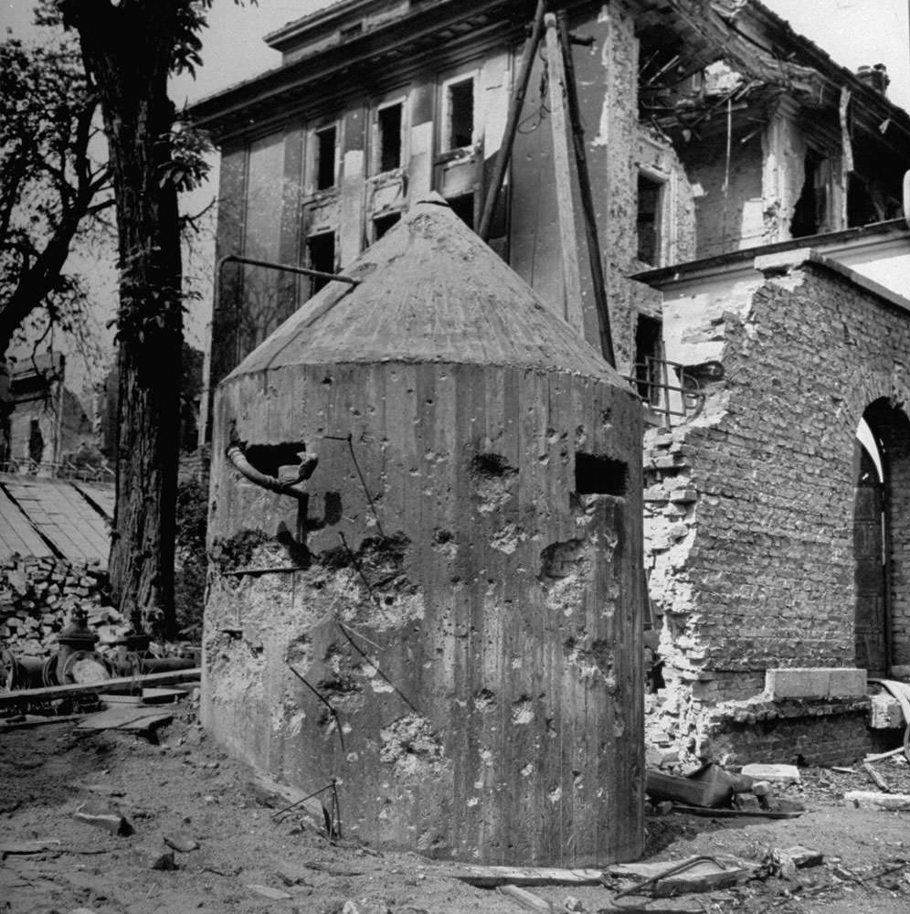 Bullet-riddled sentry pillbox outside Hitler's bunker, Berlin, 1945.