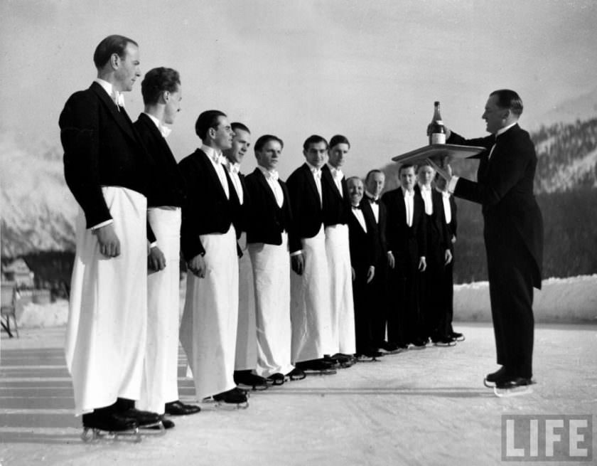 Hilarious Photos of Ice-Skating Waiters Balancing and Falling at Grand Hotel les Bains, Switzerland 1920s