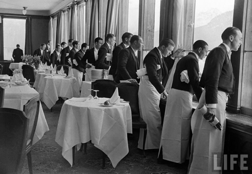 Hilarious Photos of Ice-Skating Waiters Balancing and Falling at Grand Hotel les Bains, Switzerland 1920s