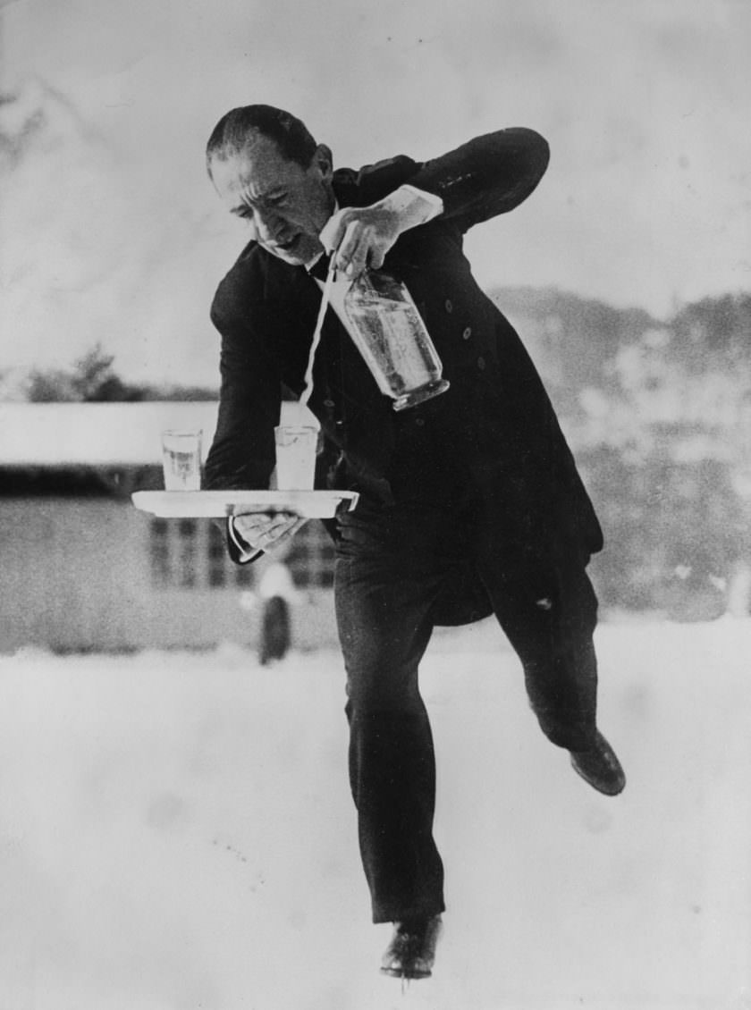 Hilarious Photos of Ice-Skating Waiters Balancing and Falling at Grand Hotel les Bains, Switzerland 1920s