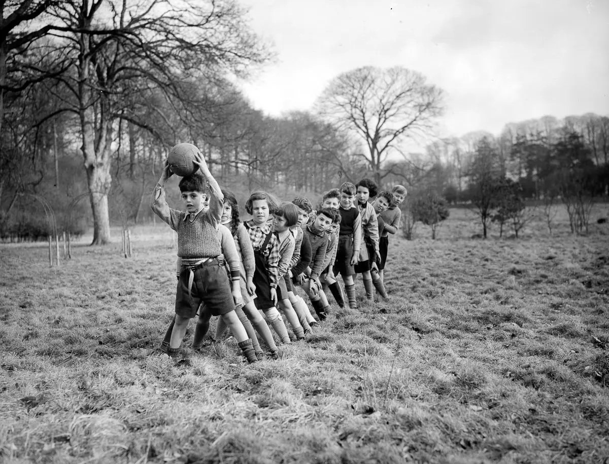 Refugees play on the grounds of Dane Court Farm, which Sir Edmund Davies has turned into a school and refuge, 1939.