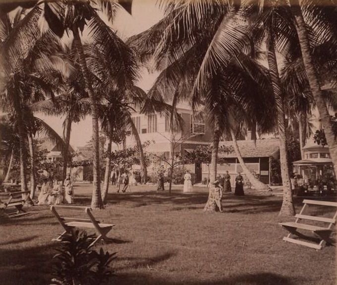 Interior of gardens with posed figures, 1870s