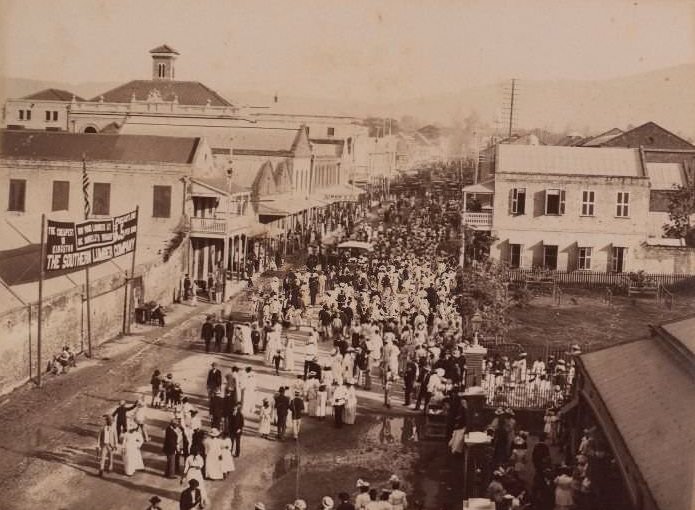 Crowded street scene taken from above, 1870s