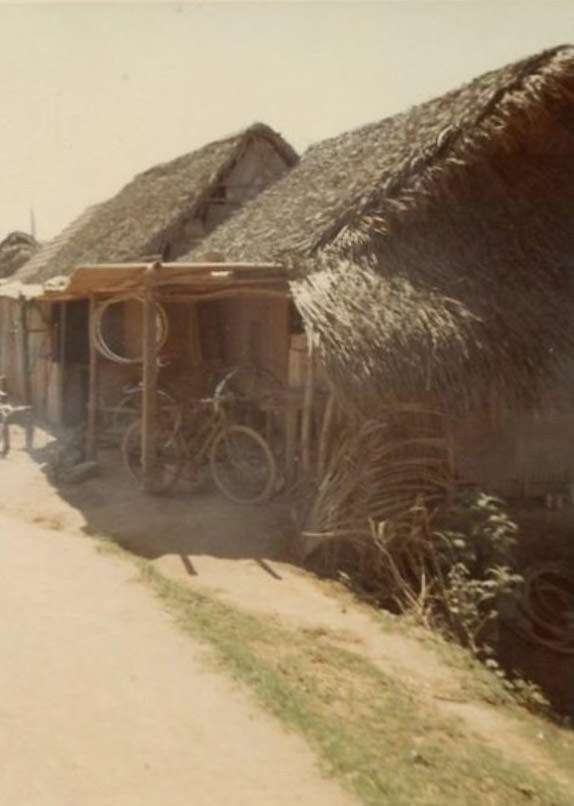 Bamboo houses in an unidentified Vietnamese village somewhere in South Vietnam.
