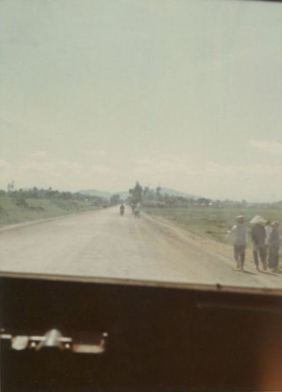 Looking out down Highway 1 in the city of Bồng Sơn in South Vietnam during the Vietnam War