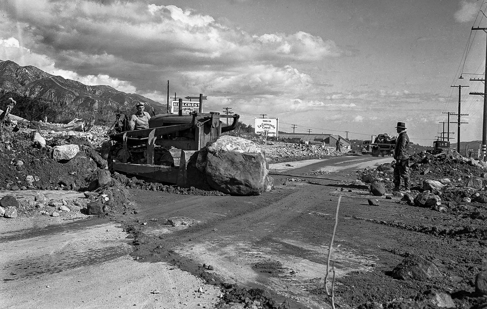 A road crew removes debris from Foothill Boulevard at Lowell Street near Tujunga, 1938