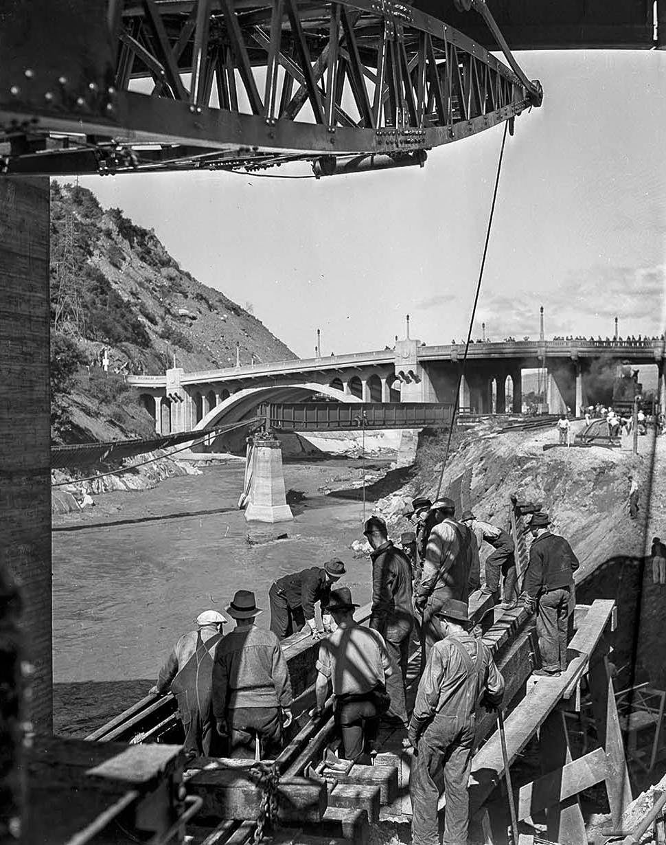 A railroad crane was set up for bridge building work over the Los Angeles River near Avenue 19, 1938