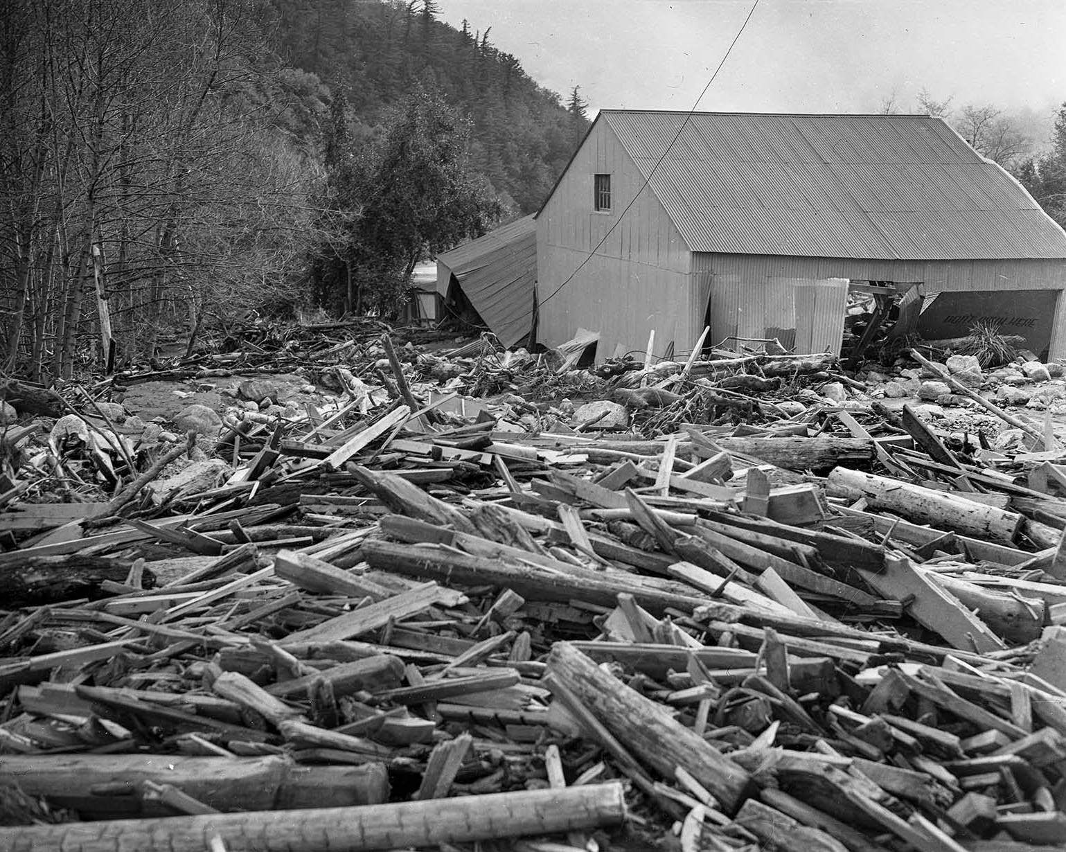 Wreckage piled up in front of the Camp Baldy garage, 1938