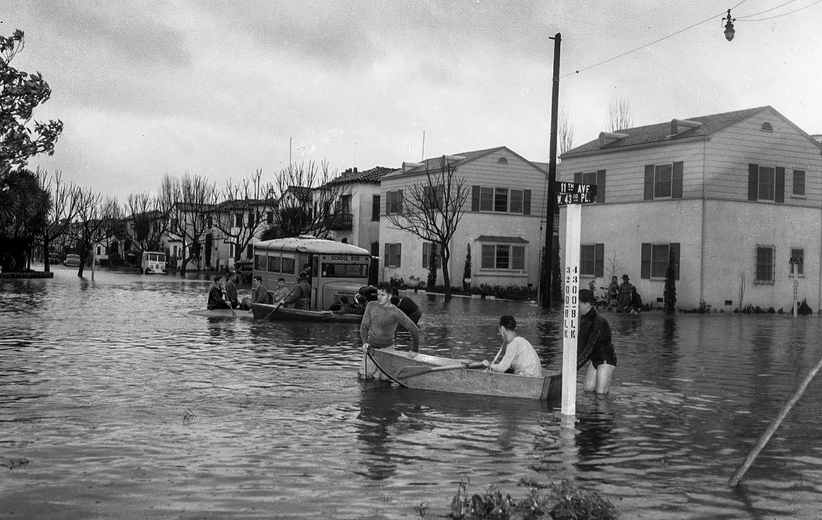 Flooding at West 43rd Place and 11th Avenue near Leimert Boulevard stranded a school bus, 1938