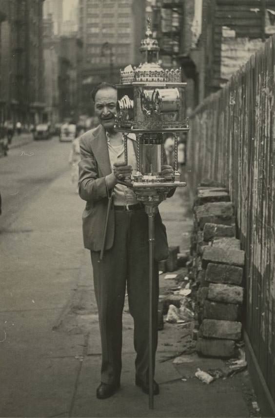 A sidewalk fortune teller near Chatham Square on the Lower East Side, 1947