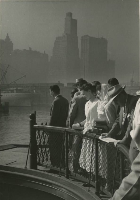 Passengers on the upper deck of a Central Railroad of New Jersey ferry in Jersey City going to Liberty Street in Manhattan, 1950