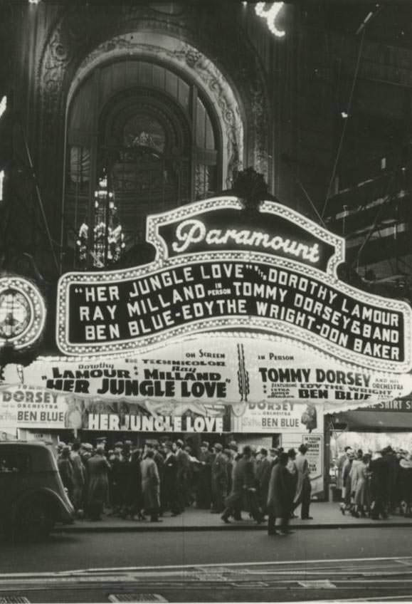 Entrance of Paramount Theatre at night in Times Square.