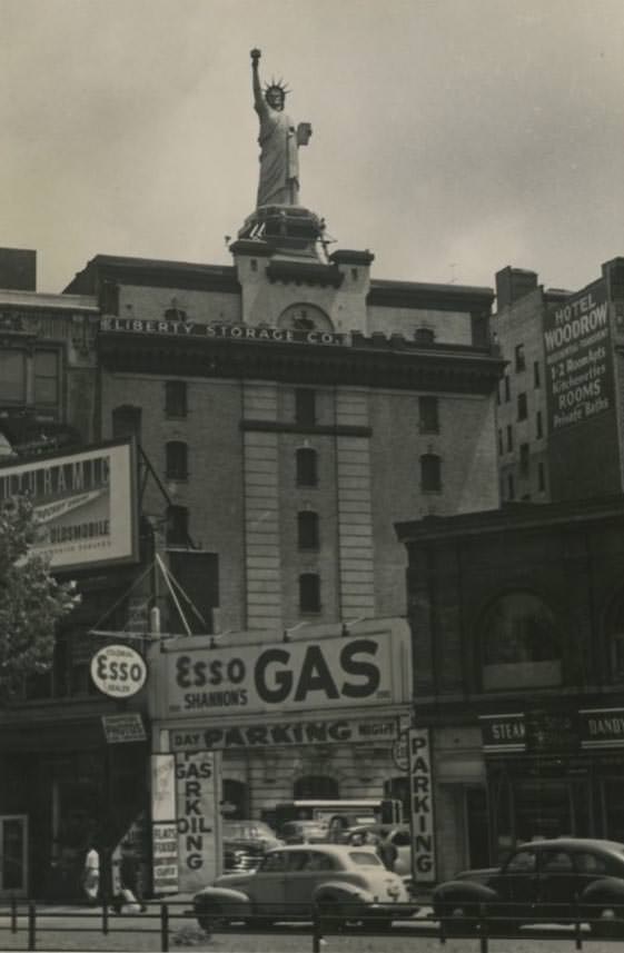 Replica of Statue of Liberty on top of Liberty Storage Company building near Lincoln Center, 1950s