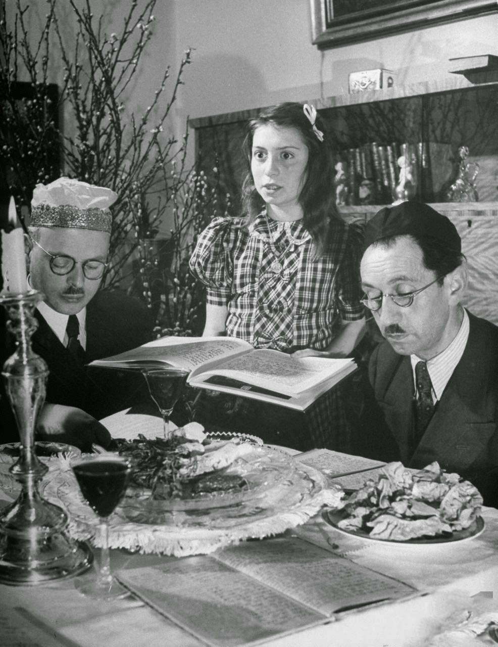 A child asking her elders ritual question during the Passover seder.