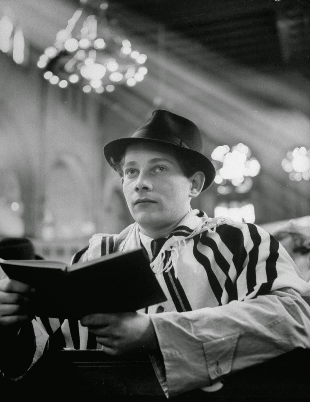 Gunter Ruschin praying at the synagogue during Passover.