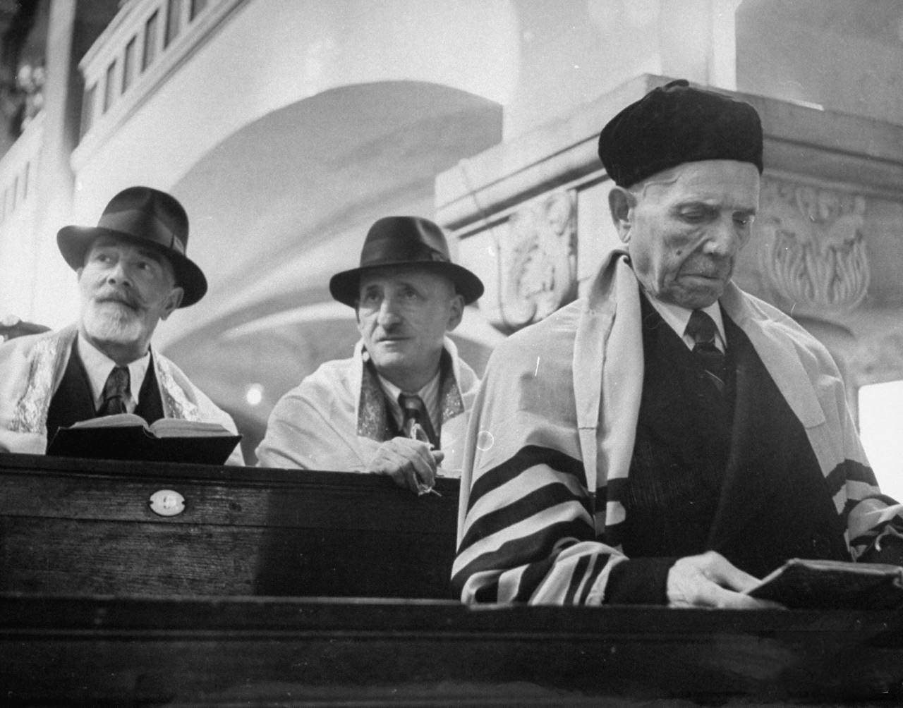 German Jews who survived concentration camps worshipping at the synagogue during Passover.