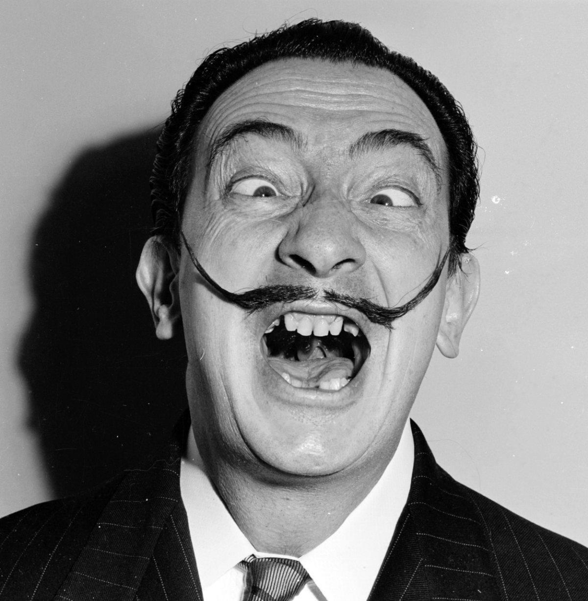 Humorous Portraits of Salvador Dalí with his Iconic Mustaches