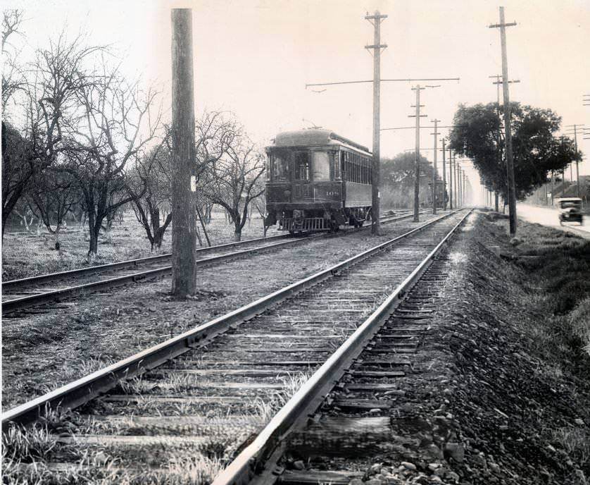 Peninsular Railway Car No. 108 speed eastbound along Stevens Creek Road, 1920s