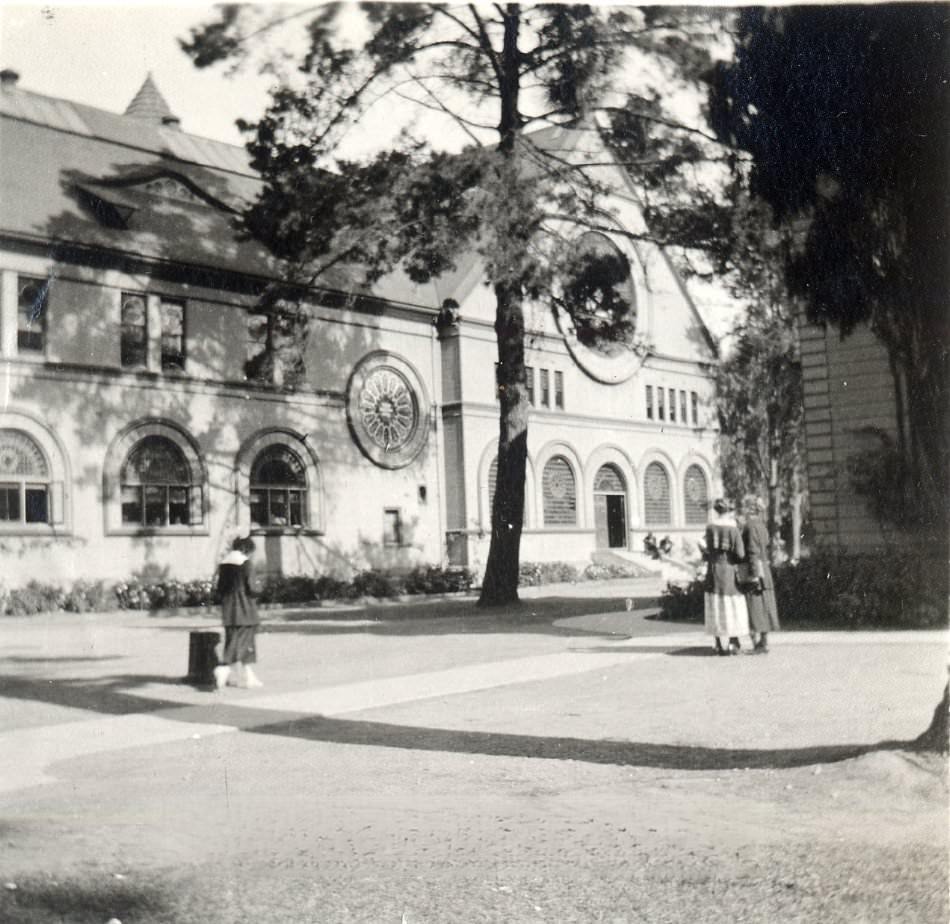 College of the Pacific building, women strolling in front of building, 1925