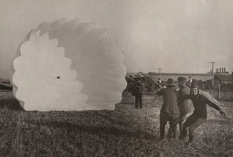 Parachutist landing, 1920s