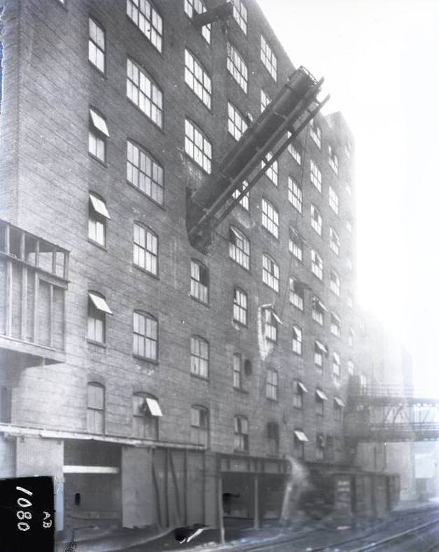 Exterior of multi-story factory, 1924.