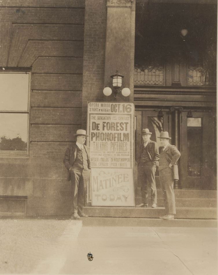 Three men next to De Forest Phonofilm matinee sign, 1925
