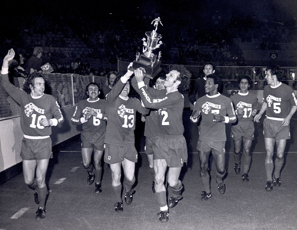 Earthquakes Hoisting the 1975 trophy